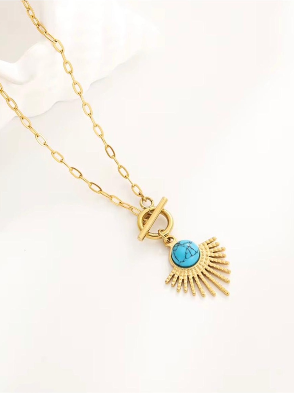 Gold-Tone Sunburst Pendant Necklace with Turquoise Stone